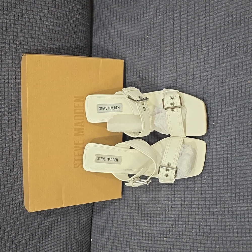White Steve Madden mule type heels with buckles